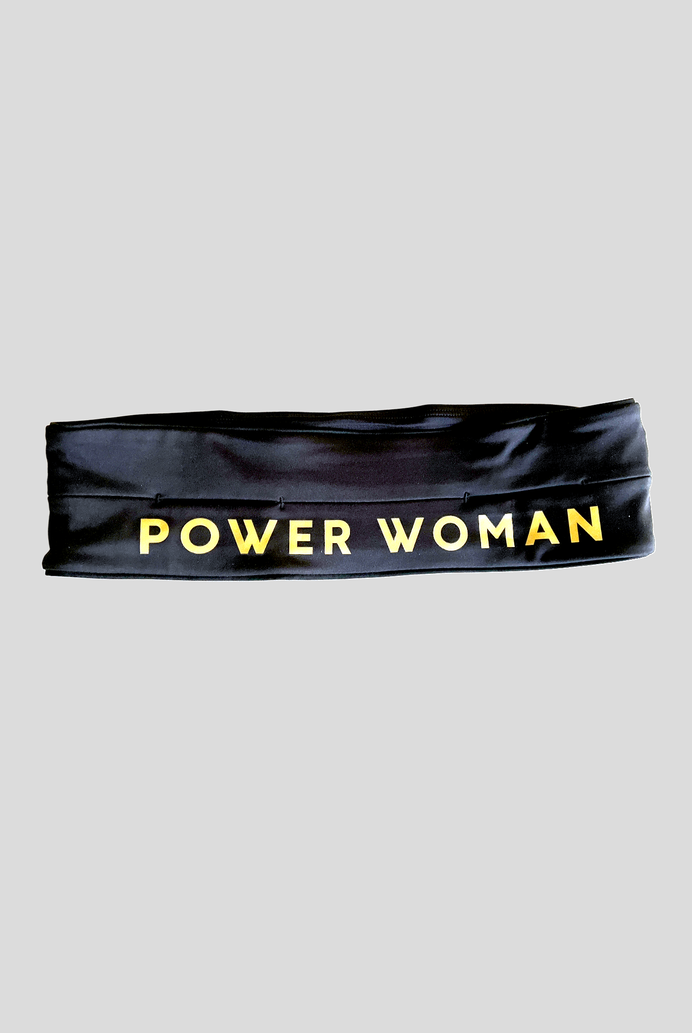 Power Woman Pocket Belt in black with logo in gold