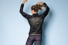 Wind Jacket  by Power Woman in the hand-printed Gold Tiger Collection is a light-weight jacket that can easily be folded into your bag or pocket. Snug fit with 4-way stretch material perfect for running, skiing or biking.