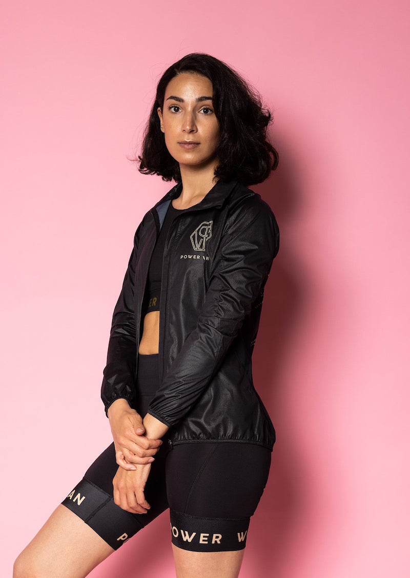 Wind Jacket  by Power Woman in the hand-printed Gold Tiger Collection is a light-weight jacket that can easily be folded into your bag or pocket. Snug fit with 4-way stretch material perfect for running, skiing or biking.